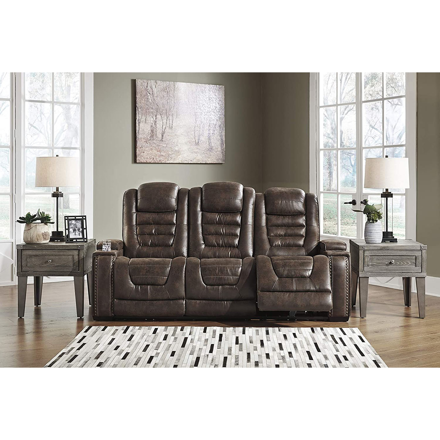 Signature Design by Ashley Game Zone Faux Leather Adjustable Power Reclining Sofa with Cup Holders and Storage